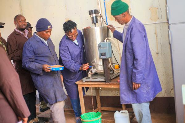Black female scientist delivering training