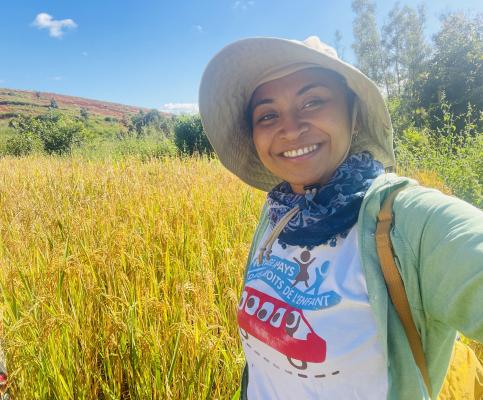 Woman in a field in sunlight