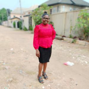 A picture on red top and black skirt 