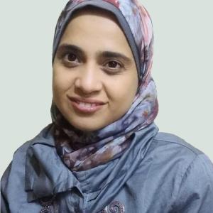 A professional headshot of Dr. Eman Taha, Associate Professor at the Egyptian Petroleum Research Institute.